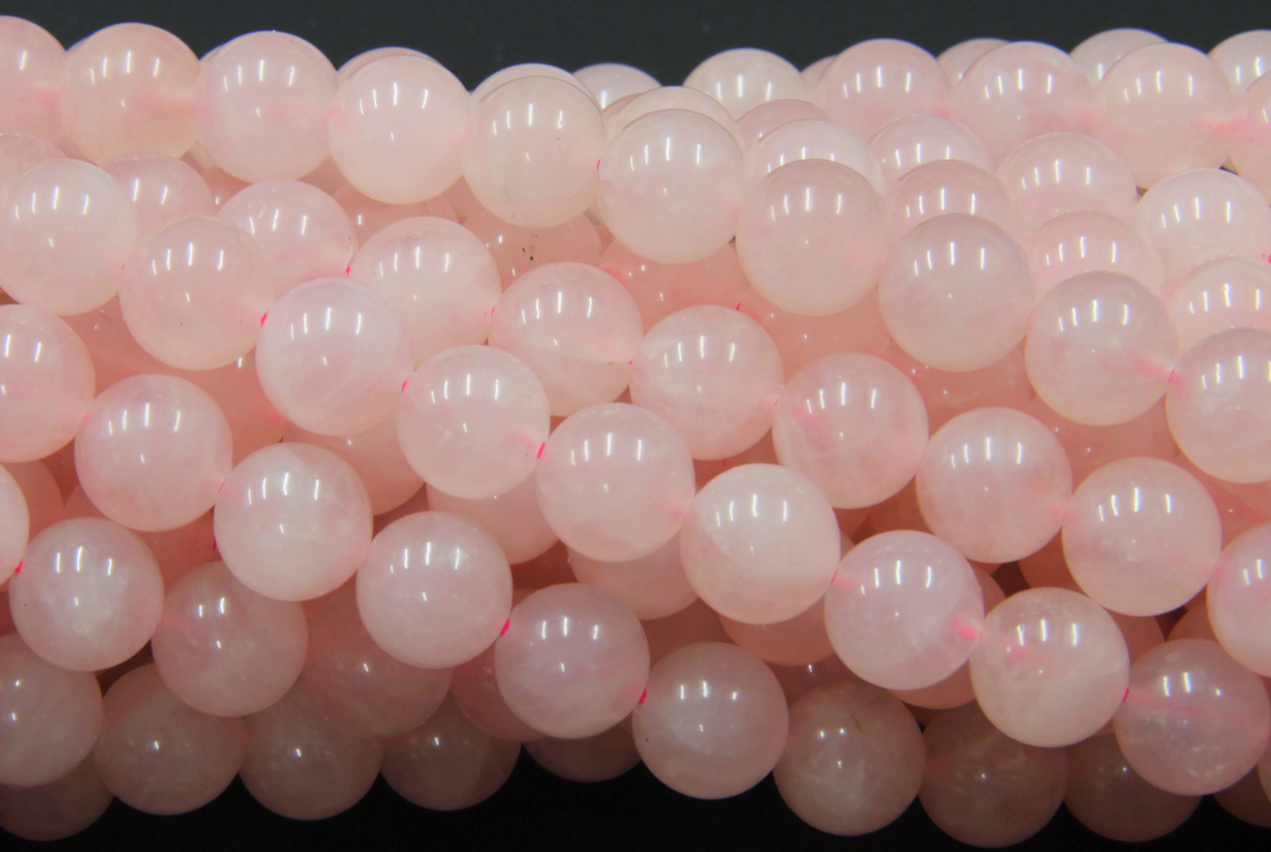 QUARZO ROSA LISCIO E SFACCETTATO