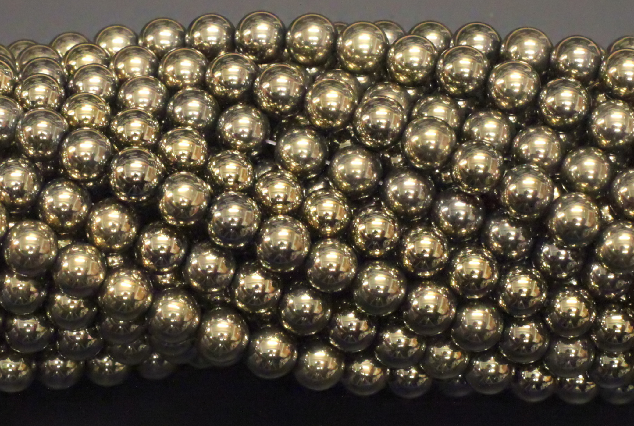 EMATITE COLOR PIRITE LISCIA E SFACCETTATA
